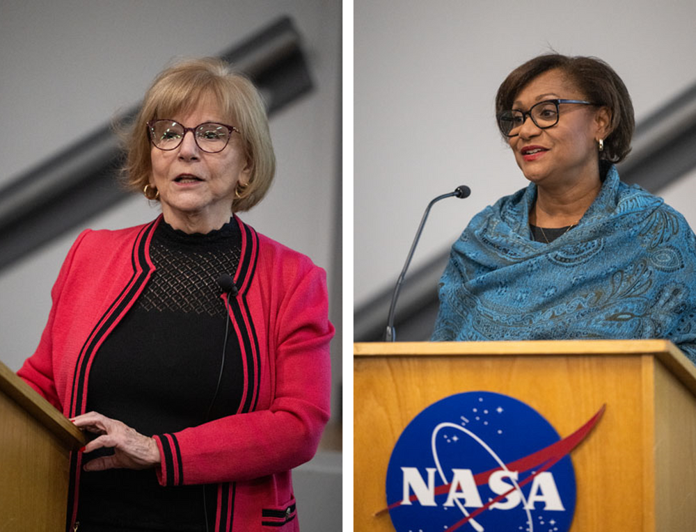 Side-by-side photos of two women speaking at a podium. One wears glasses, a pink open-front sweater, and a black shirt. The other wears glasses and a blue paisely shawl wrapped around her shoulders.